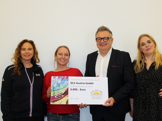 Representatives-from-GLS-donating-money-to-Austrian-Children's-Cancer-Aid